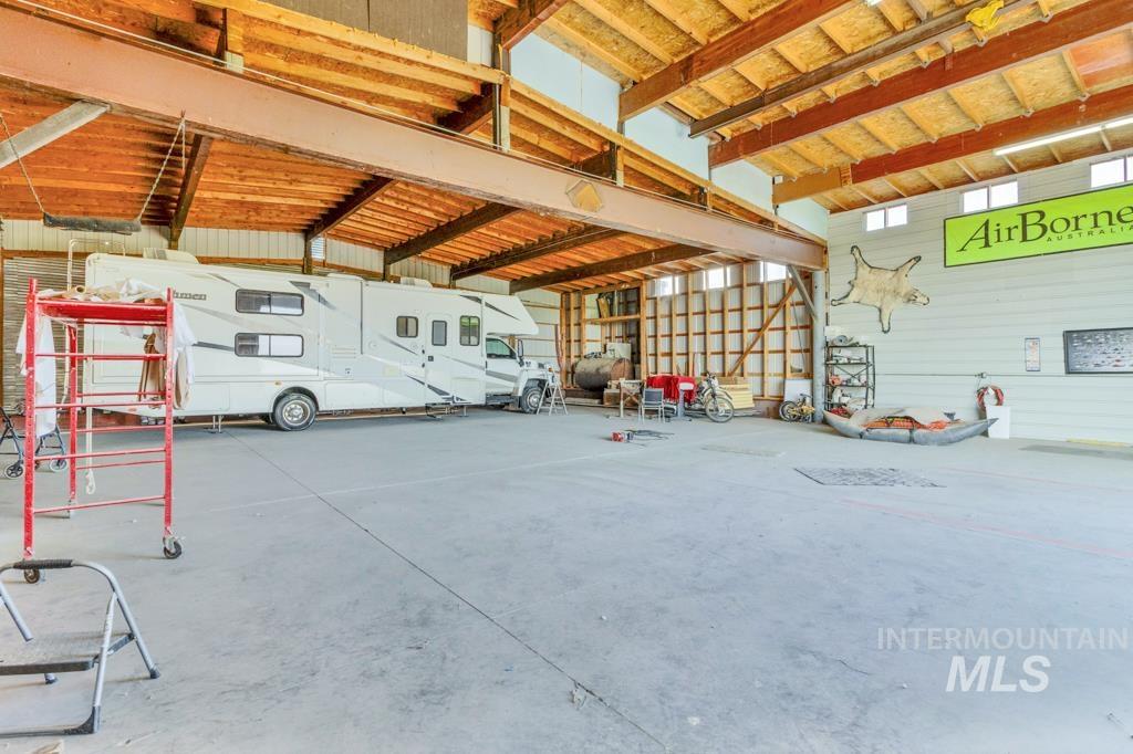 Garage featuring oil tank