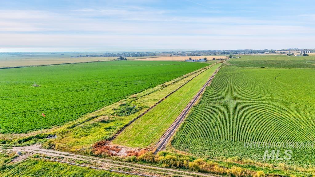 View of rural area with large plots for crops