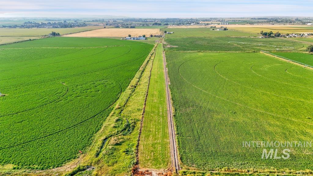 Aerial view of sparsely populated area with extensive farmland
