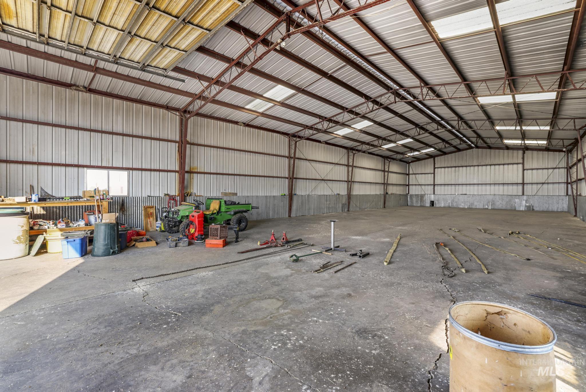 Garage featuring metal wall
