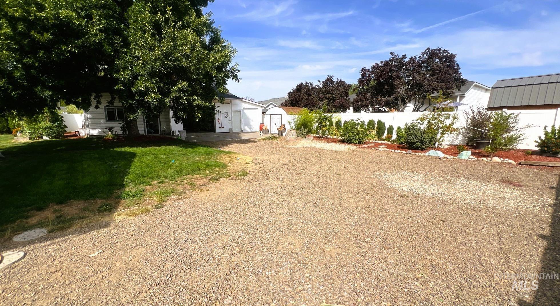 View of yard featuring an outdoor structure