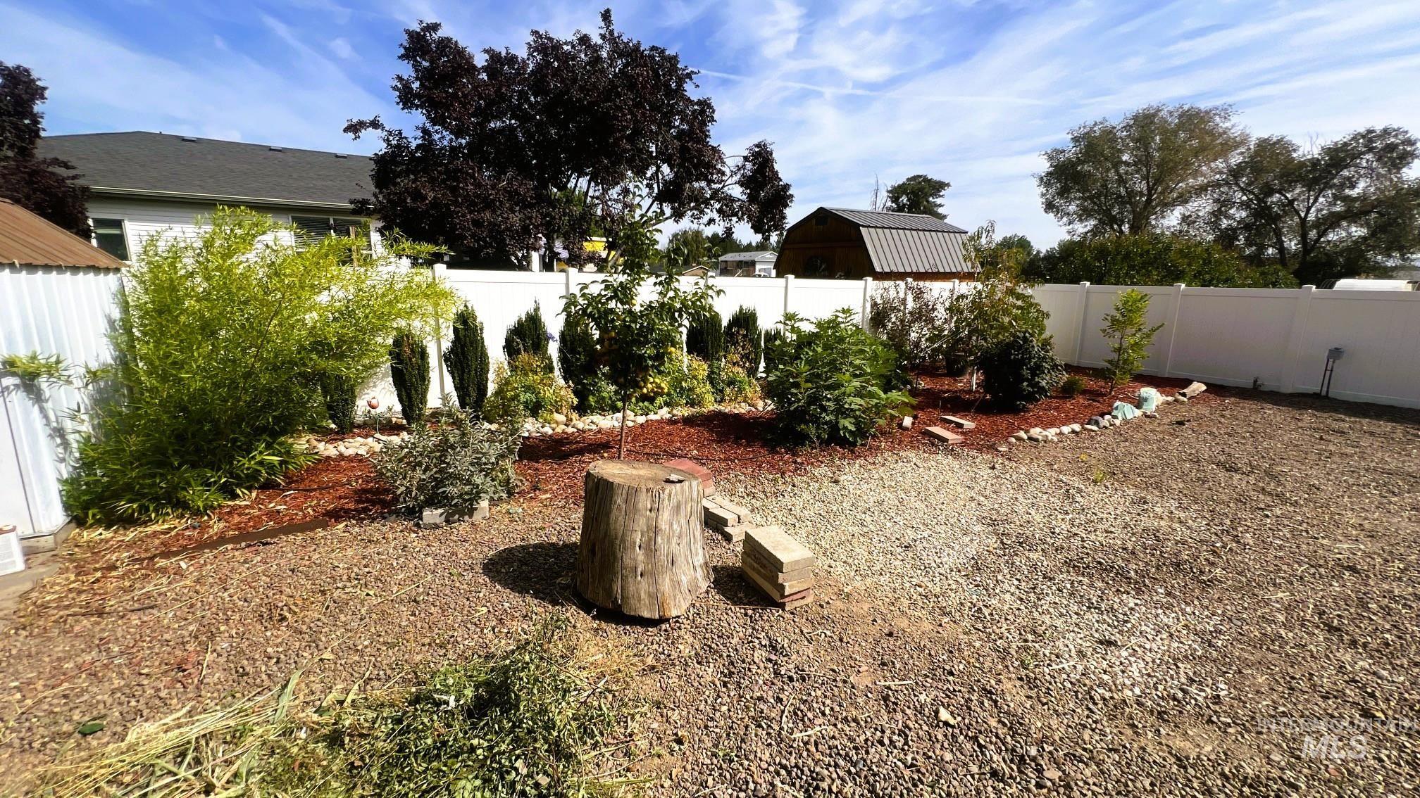 View of fenced backyard