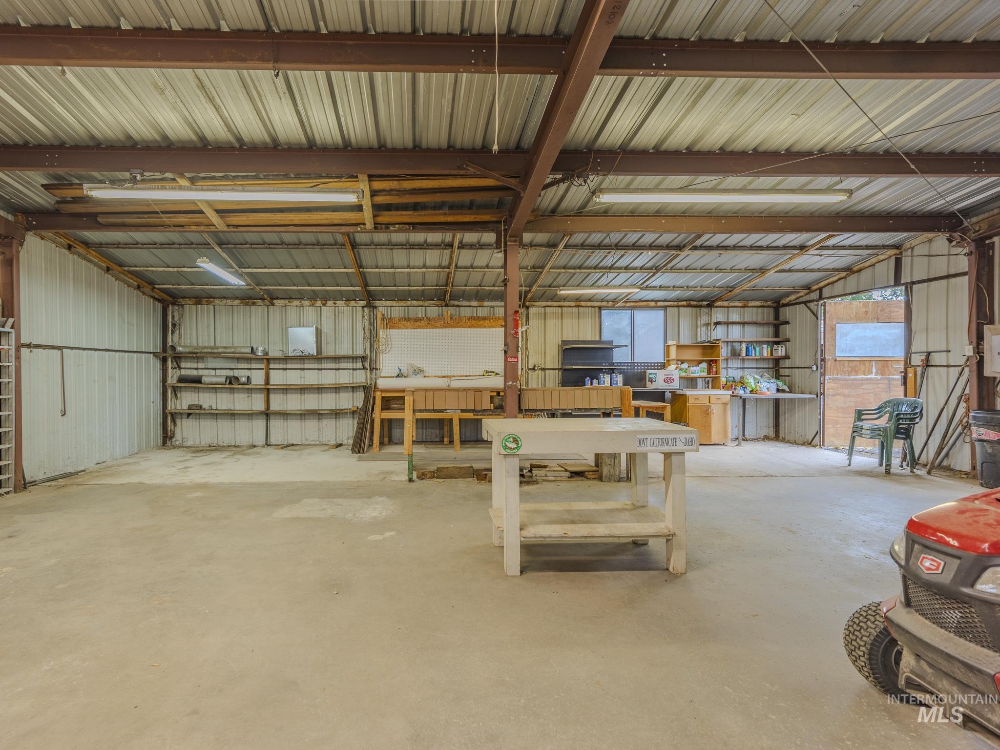 Garage featuring metal wall