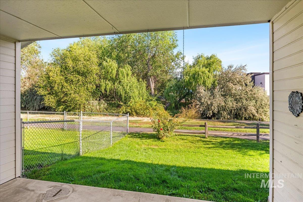 View of yard with a patio