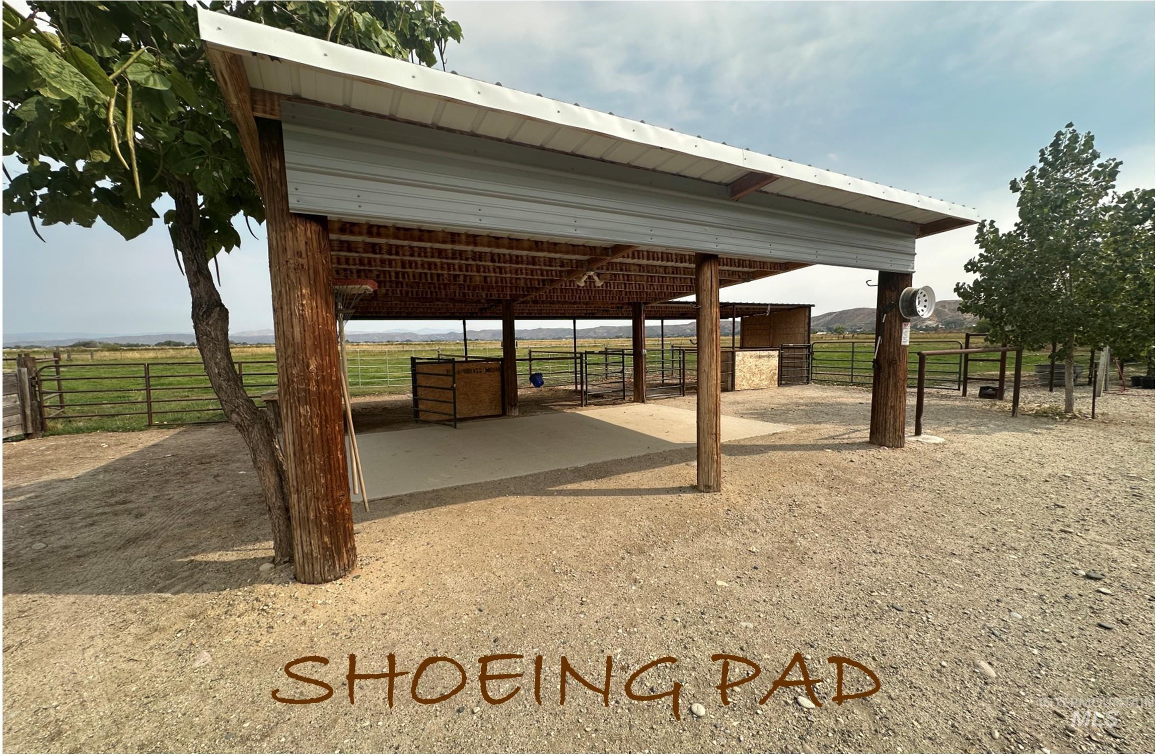 View of property's community featuring an outbuilding, an exterior structure, and a view of rural / pastoral area