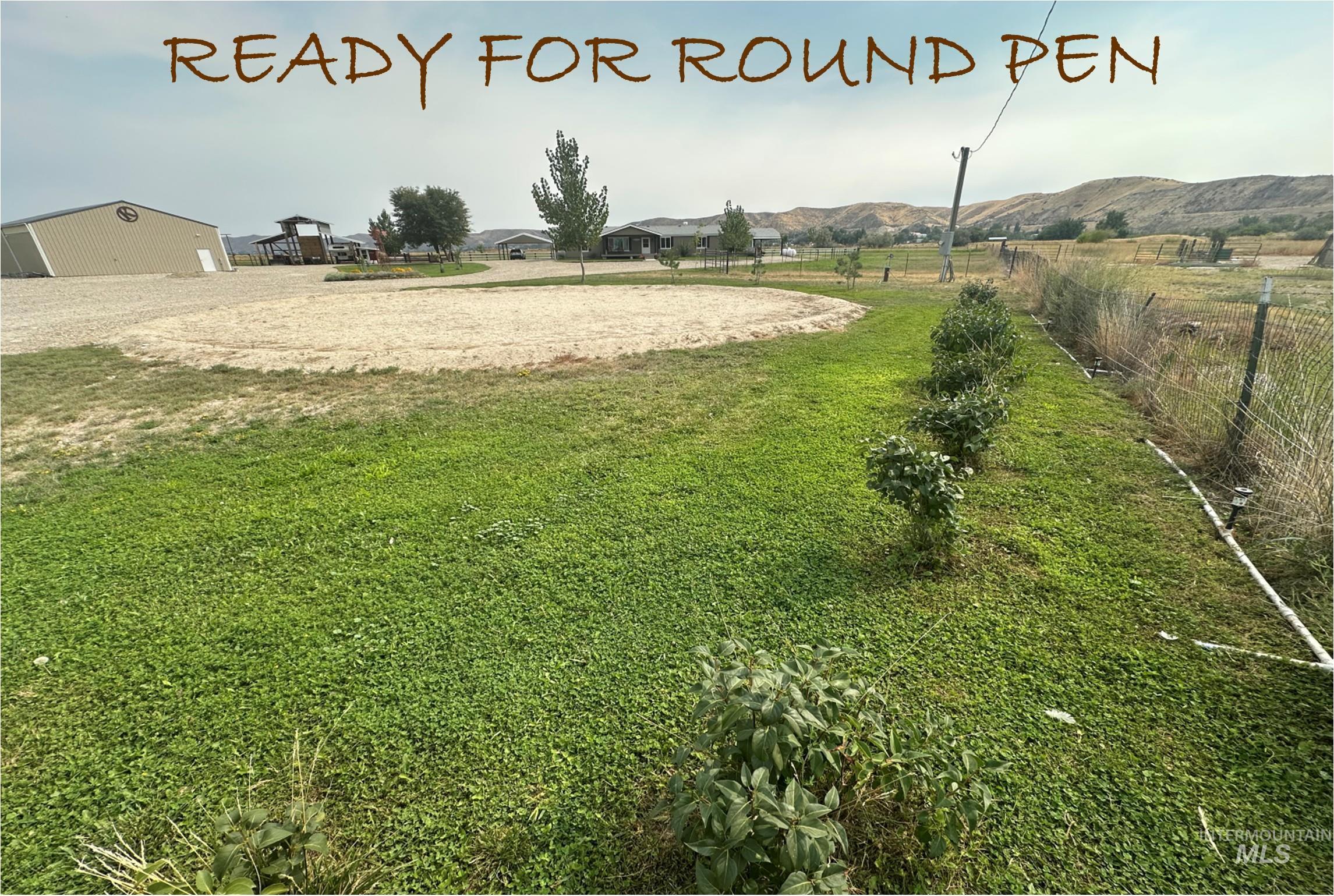 View of property's community with a view of countryside and a mountain view
