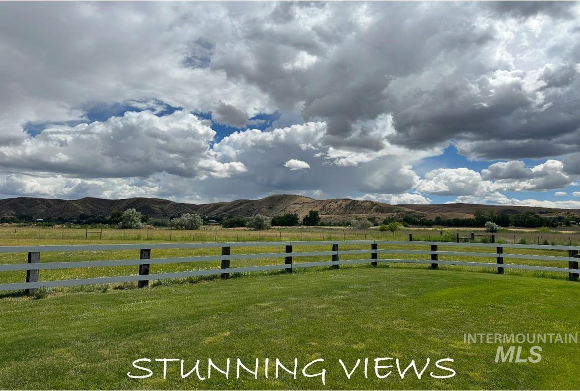 View of yard with a view of countryside and a mountain view