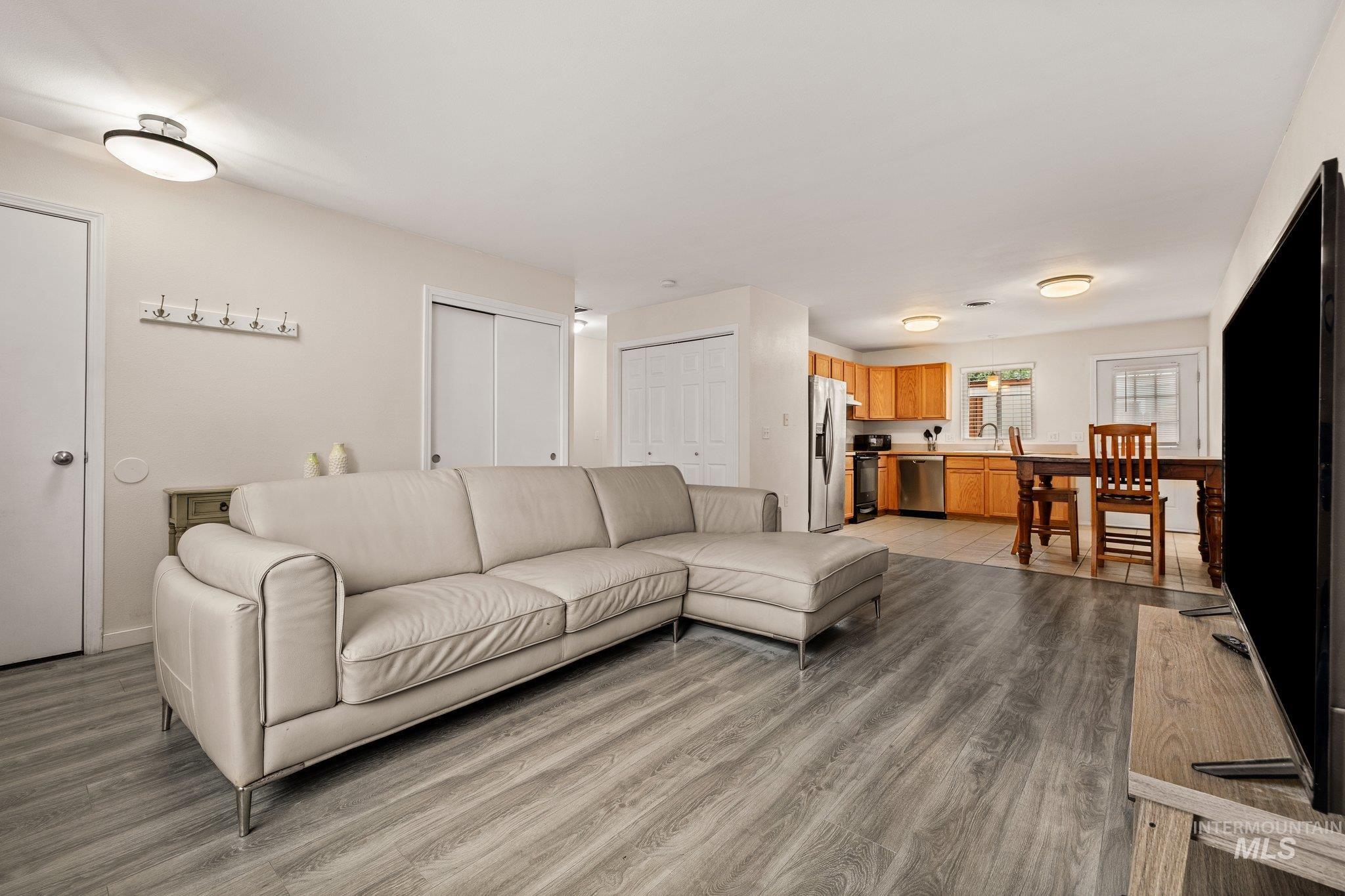 Living area featuring light wood-style flooring
