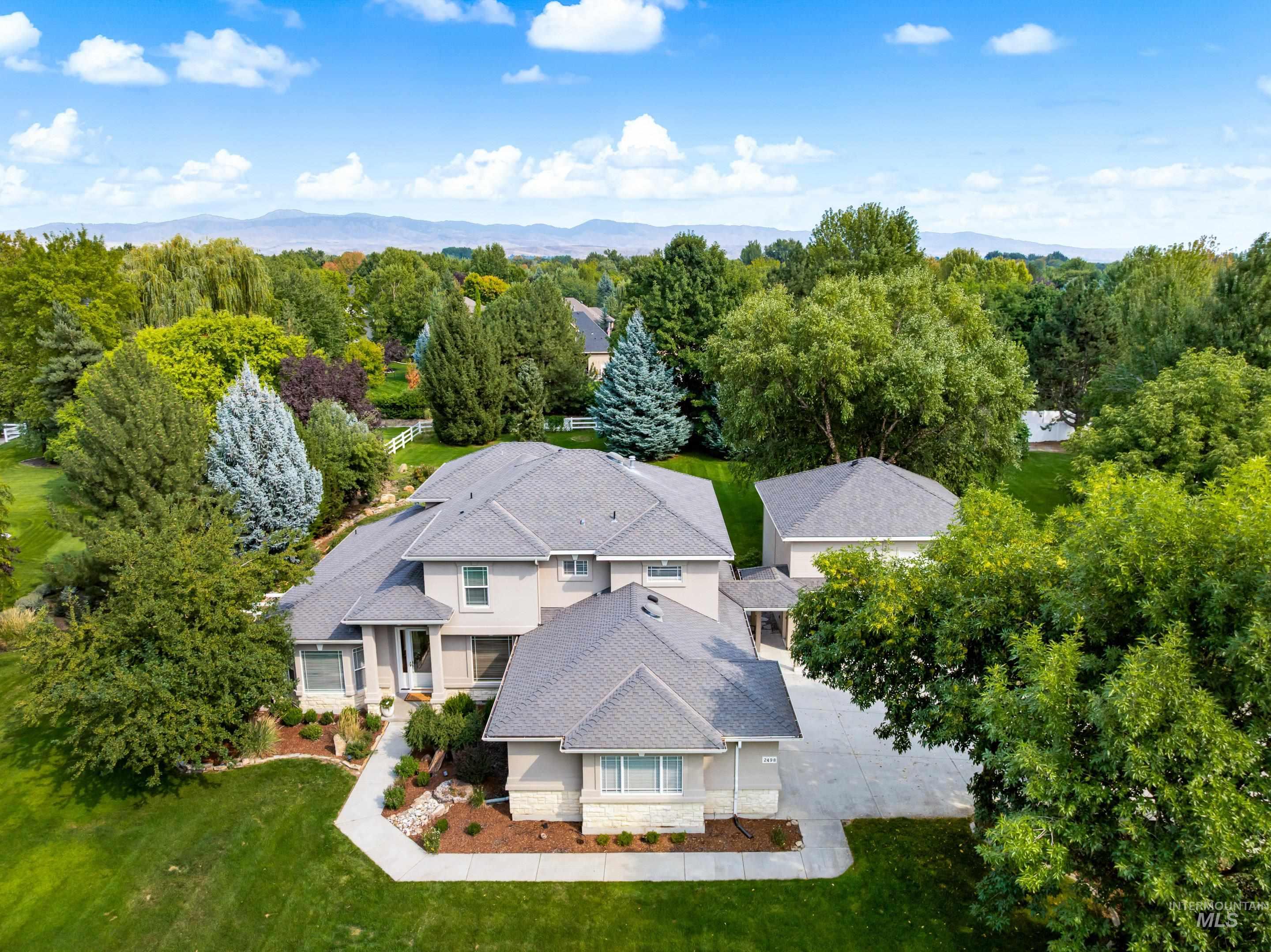 View from above of property with a mountainous background