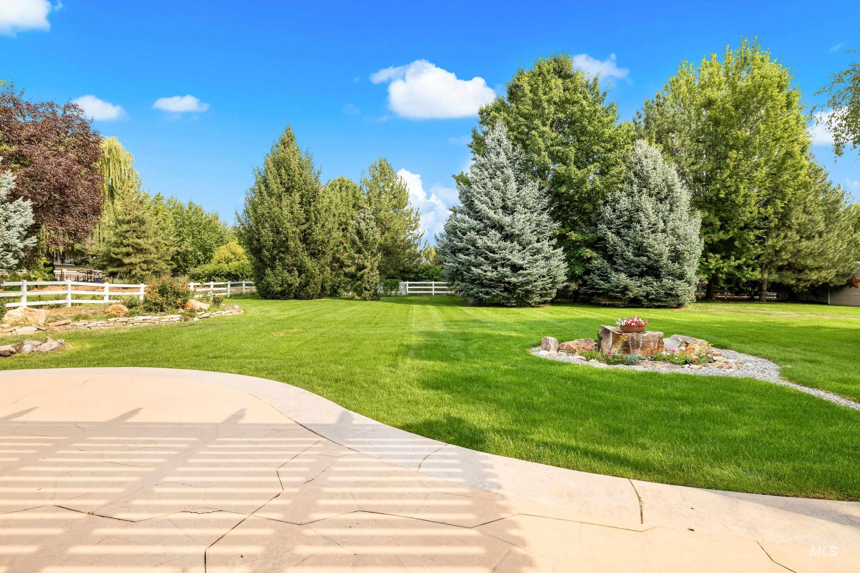 View of yard with a patio area