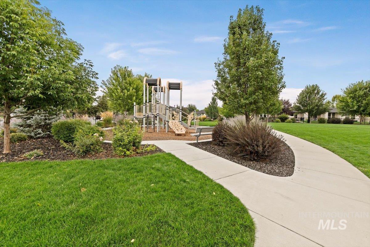 View of community featuring a lawn