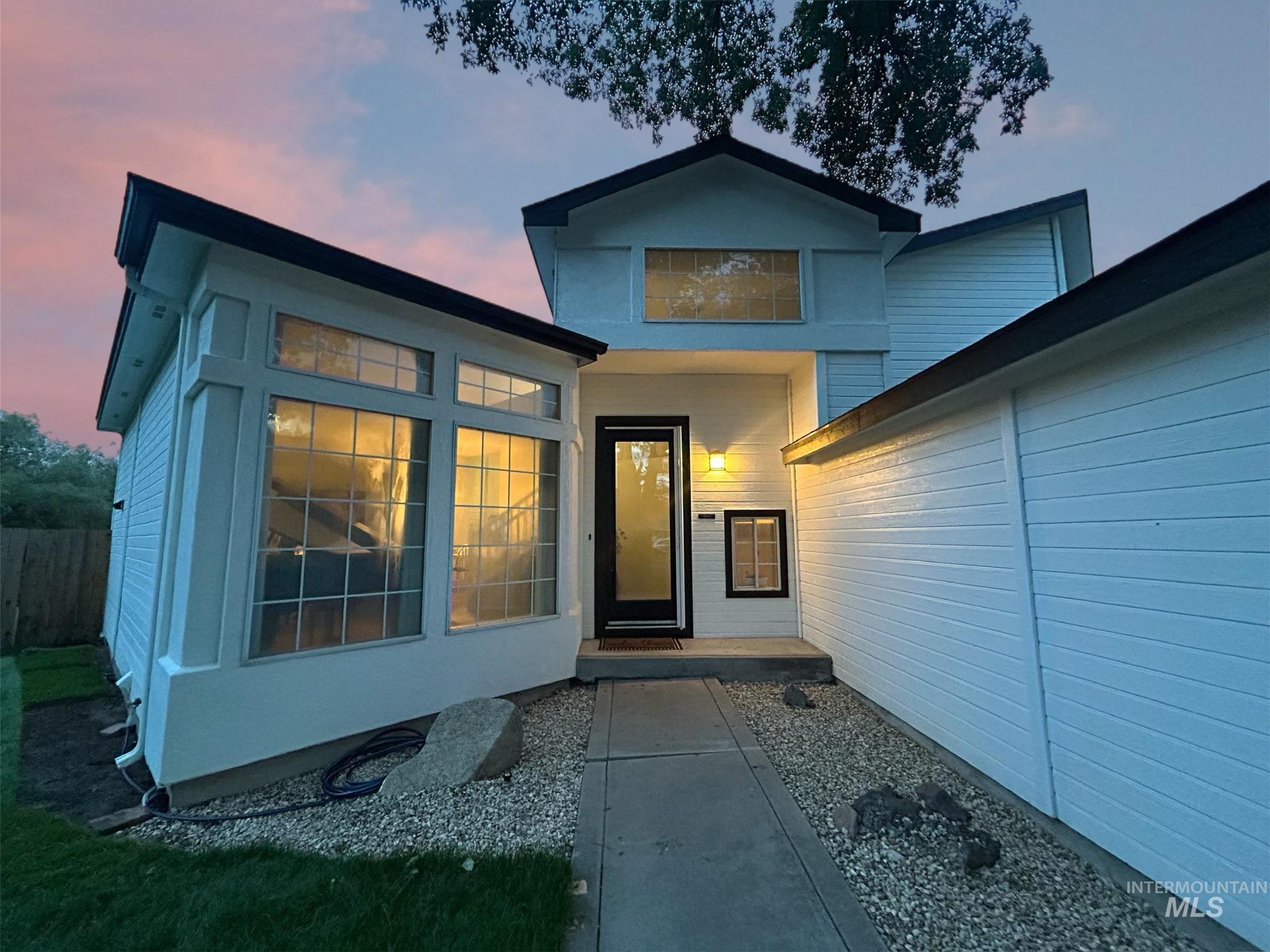View of exterior entry at dusk