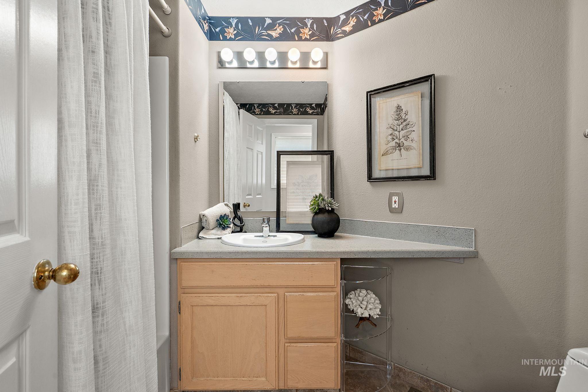Bathroom with vanity and toilet