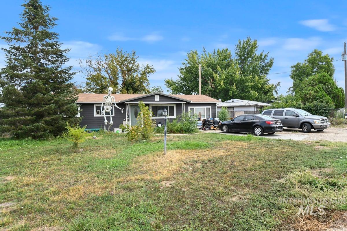 View of front of home featuring a front yard