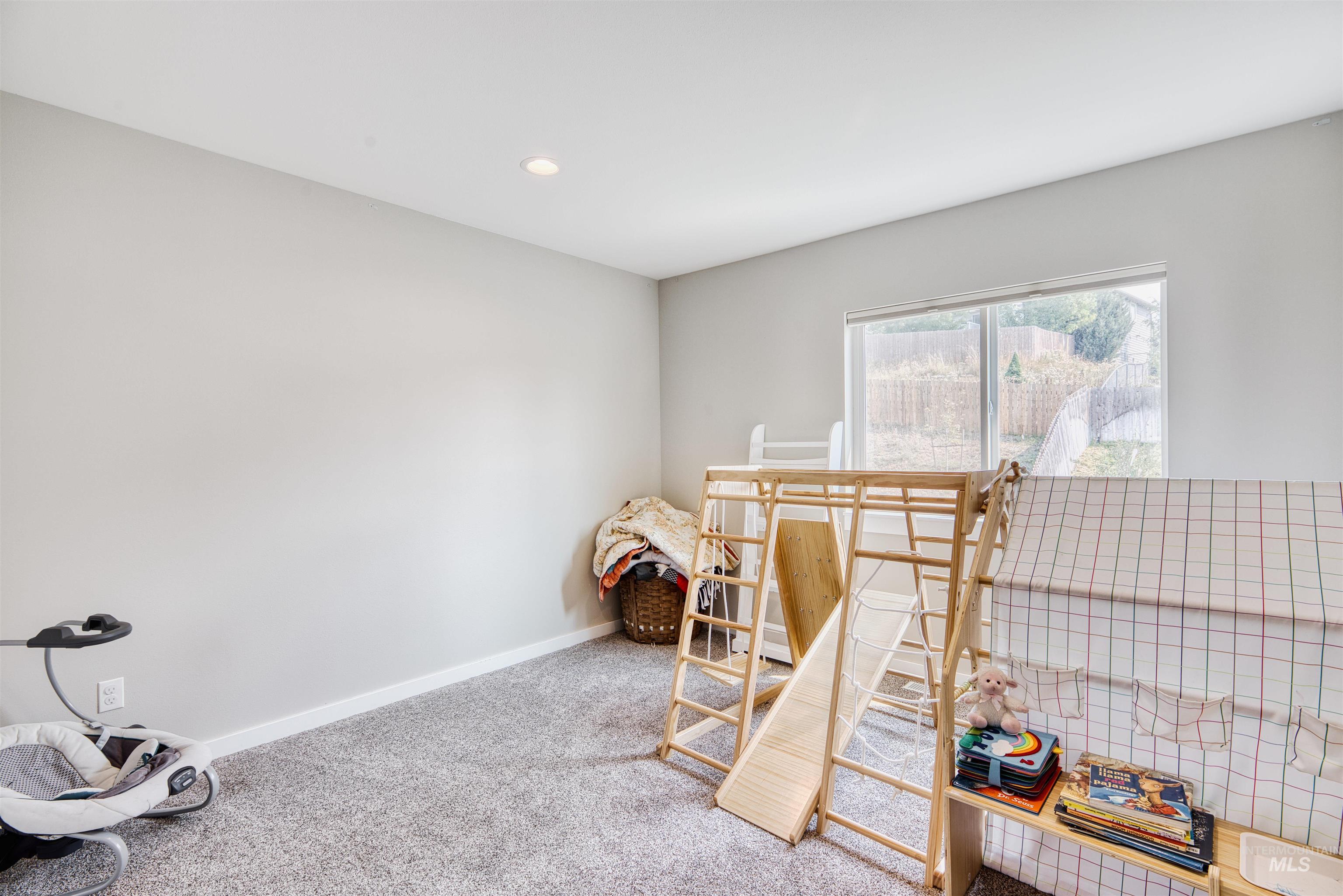 Bedroom featuring carpet floors and recessed lighting