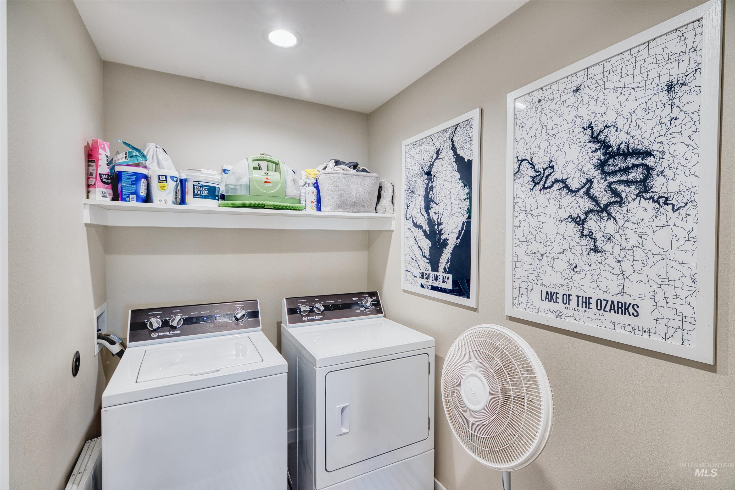 Laundry area featuring washer and clothes dryer