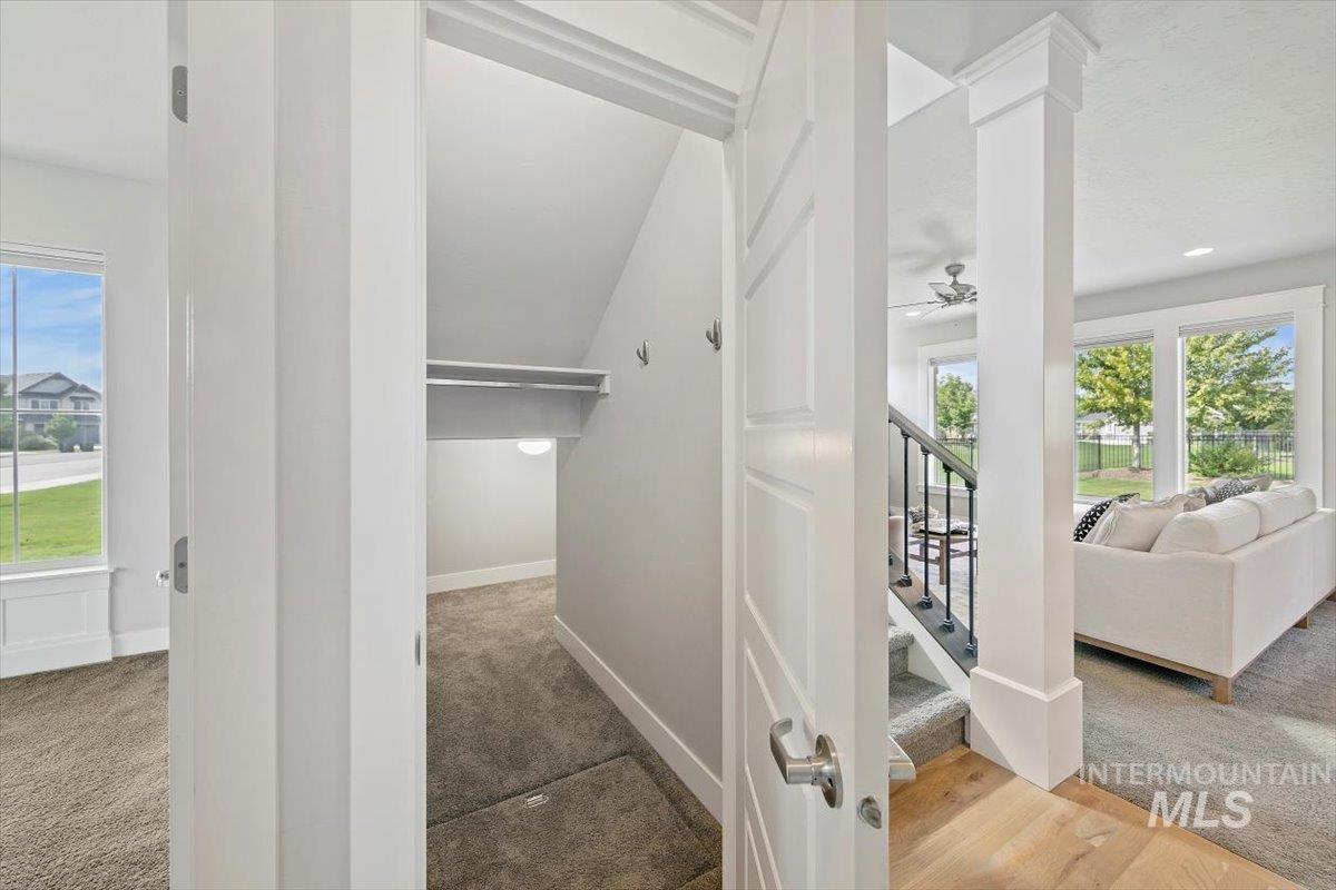 Hallway with light carpet