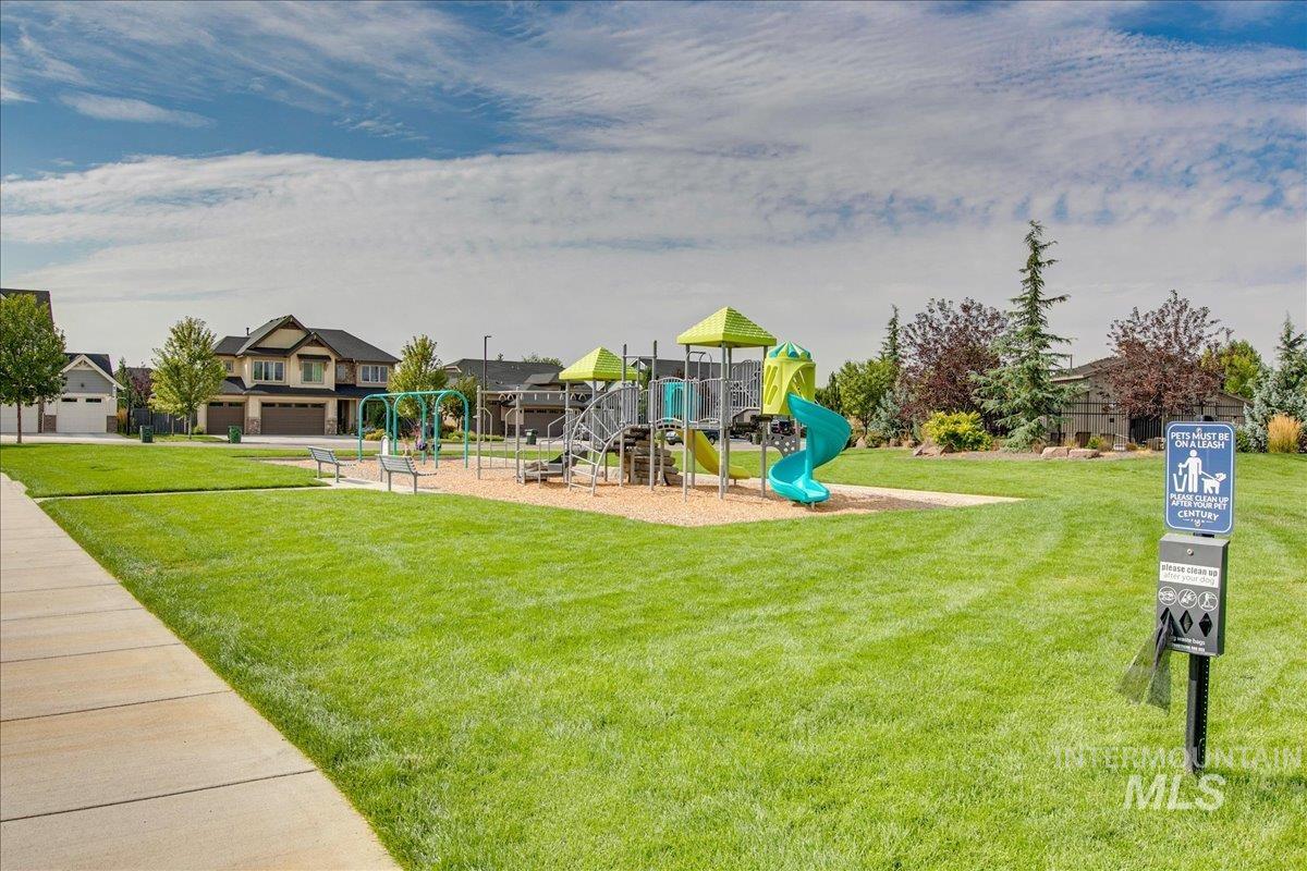 Community playground with a lawn