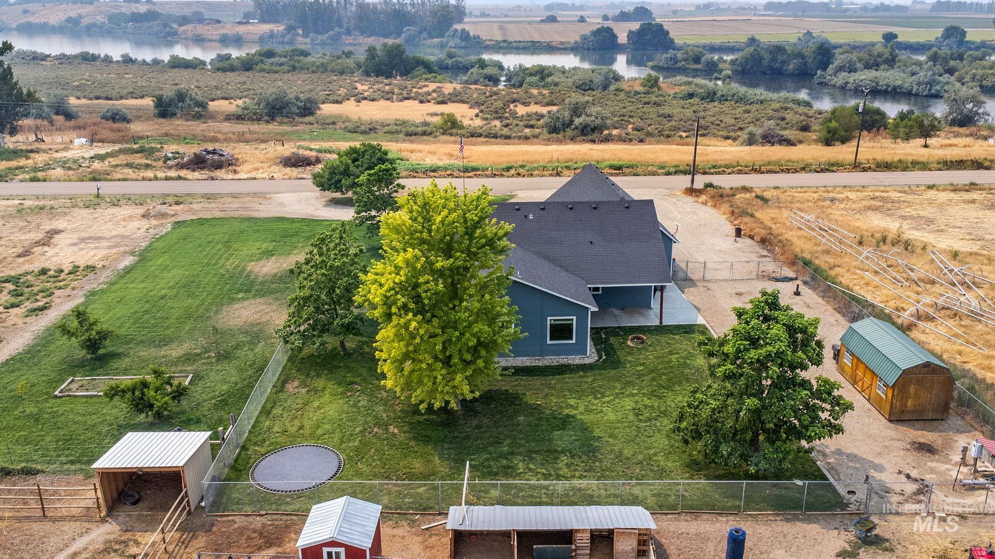 Overview of rural landscape featuring a nearby body of water