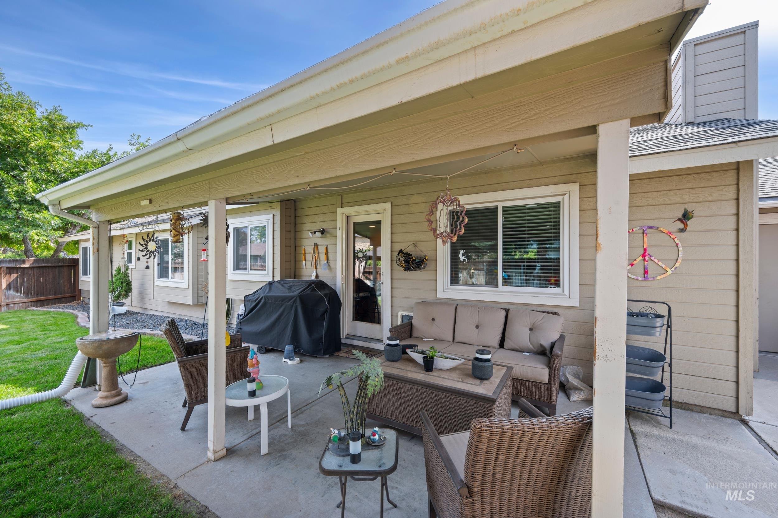 View of patio featuring outdoor lounge area and area for grilling