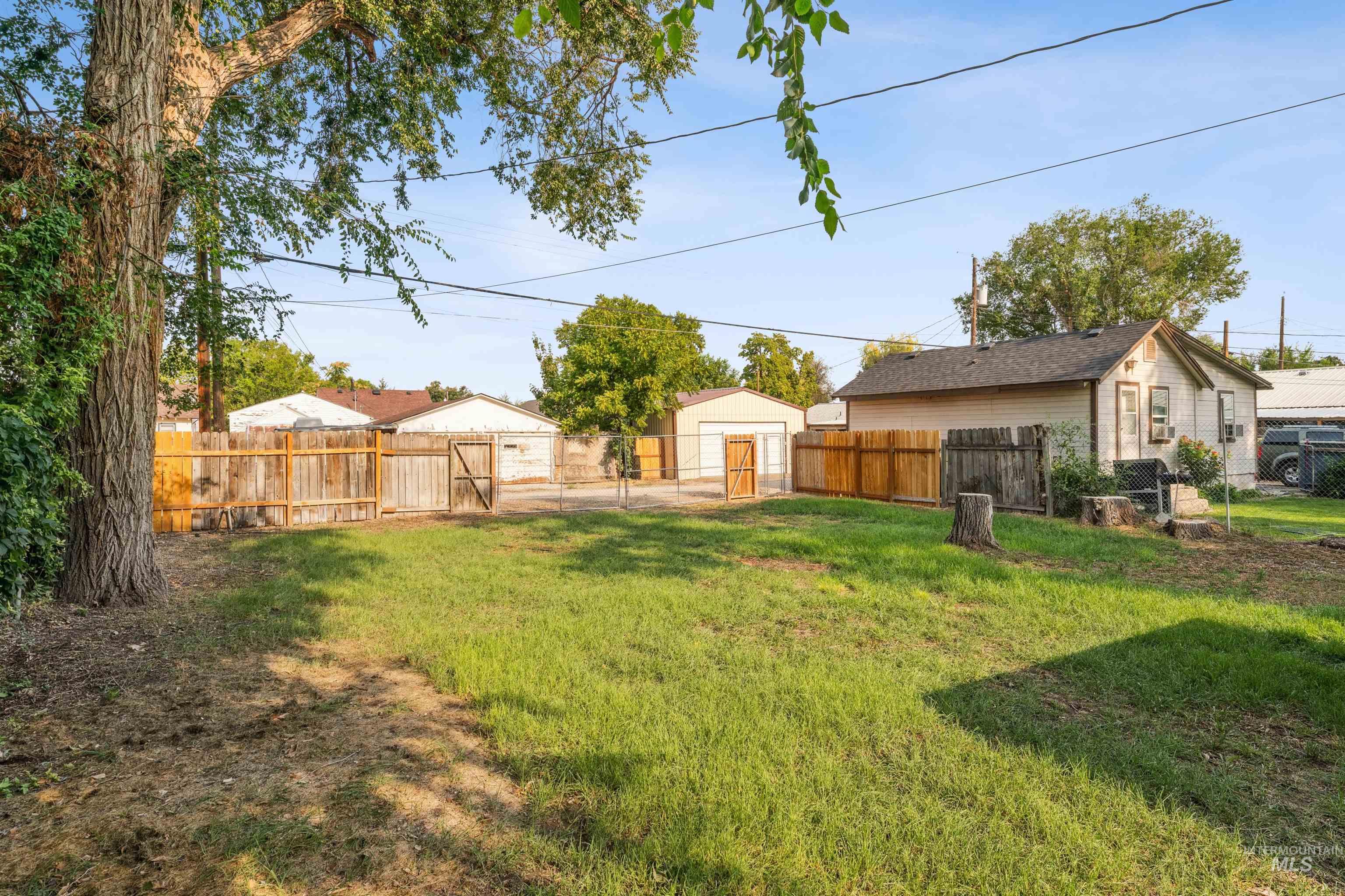 View of fenced backyard