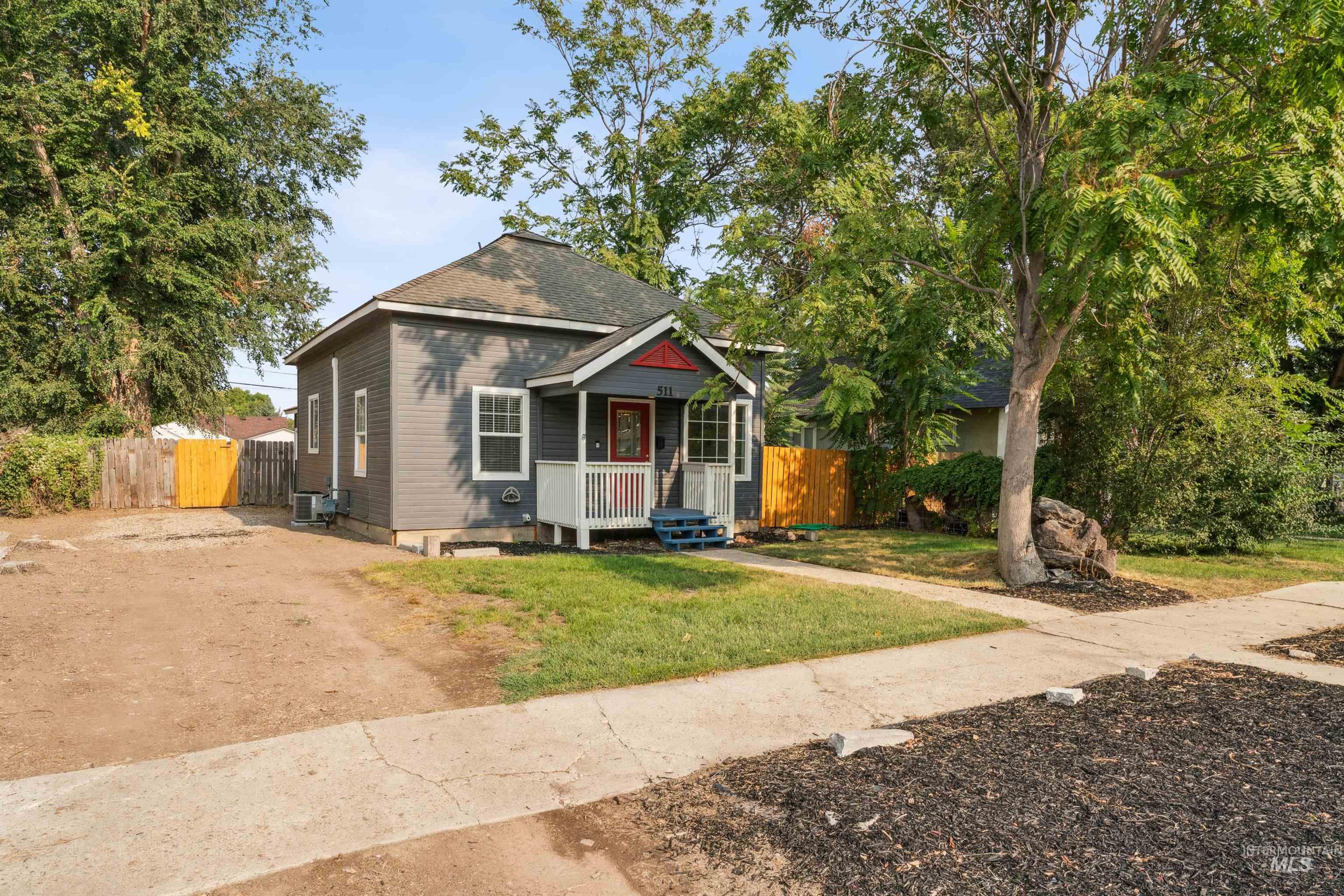 Bungalow-style house featuring covered porch