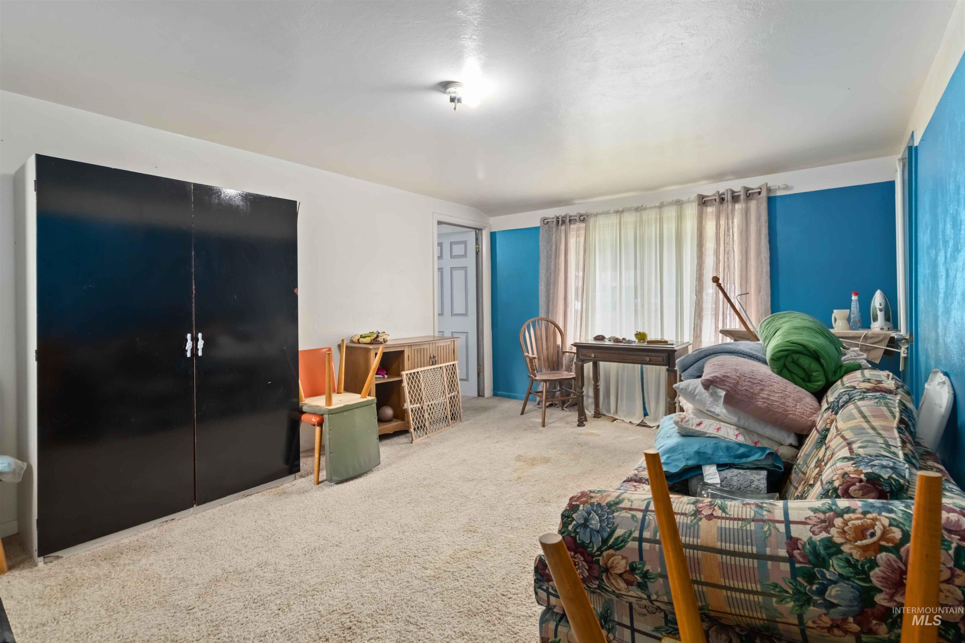 Living area with carpet flooring