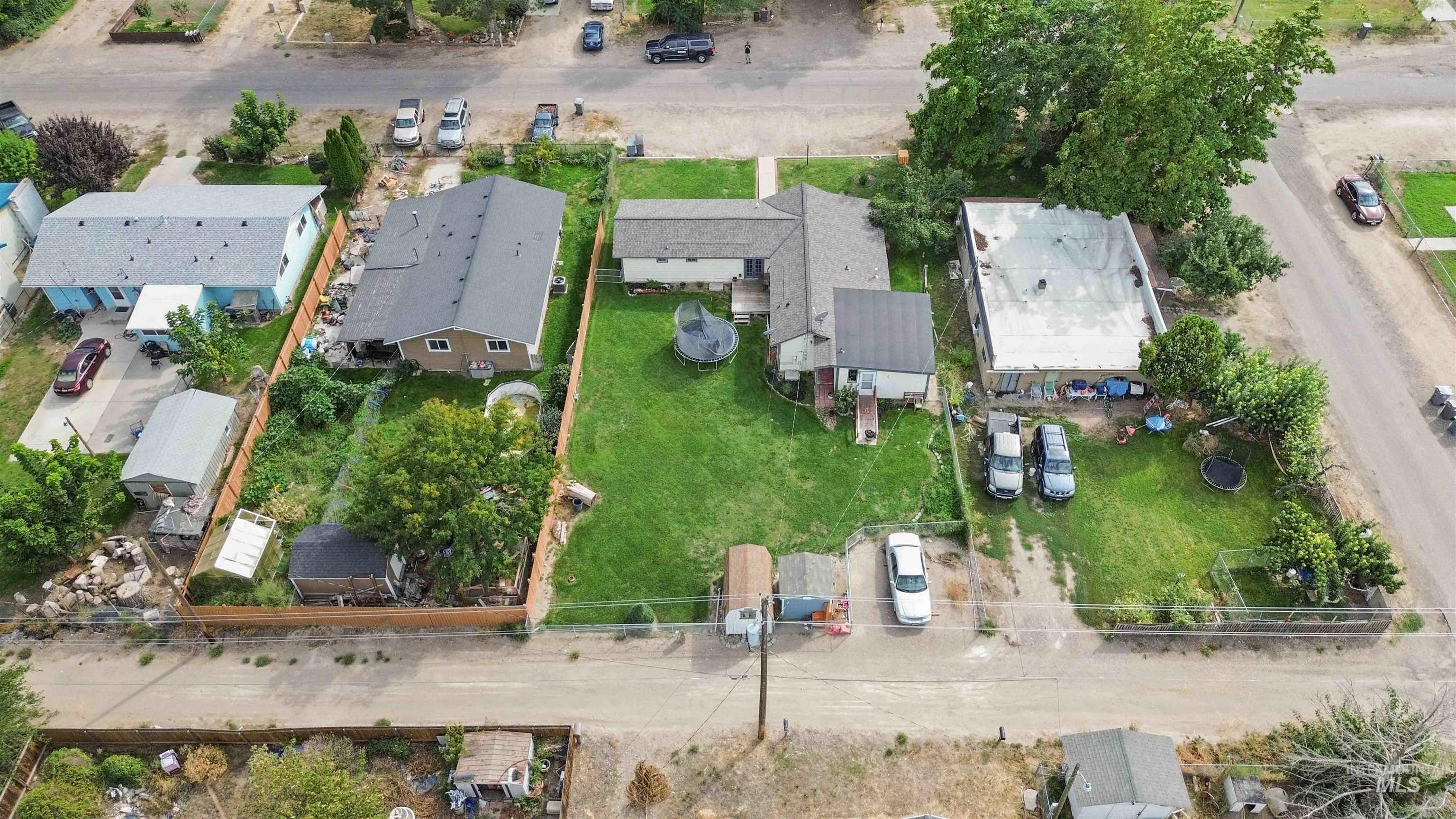 Aerial overview of property's location featuring nearby suburban area