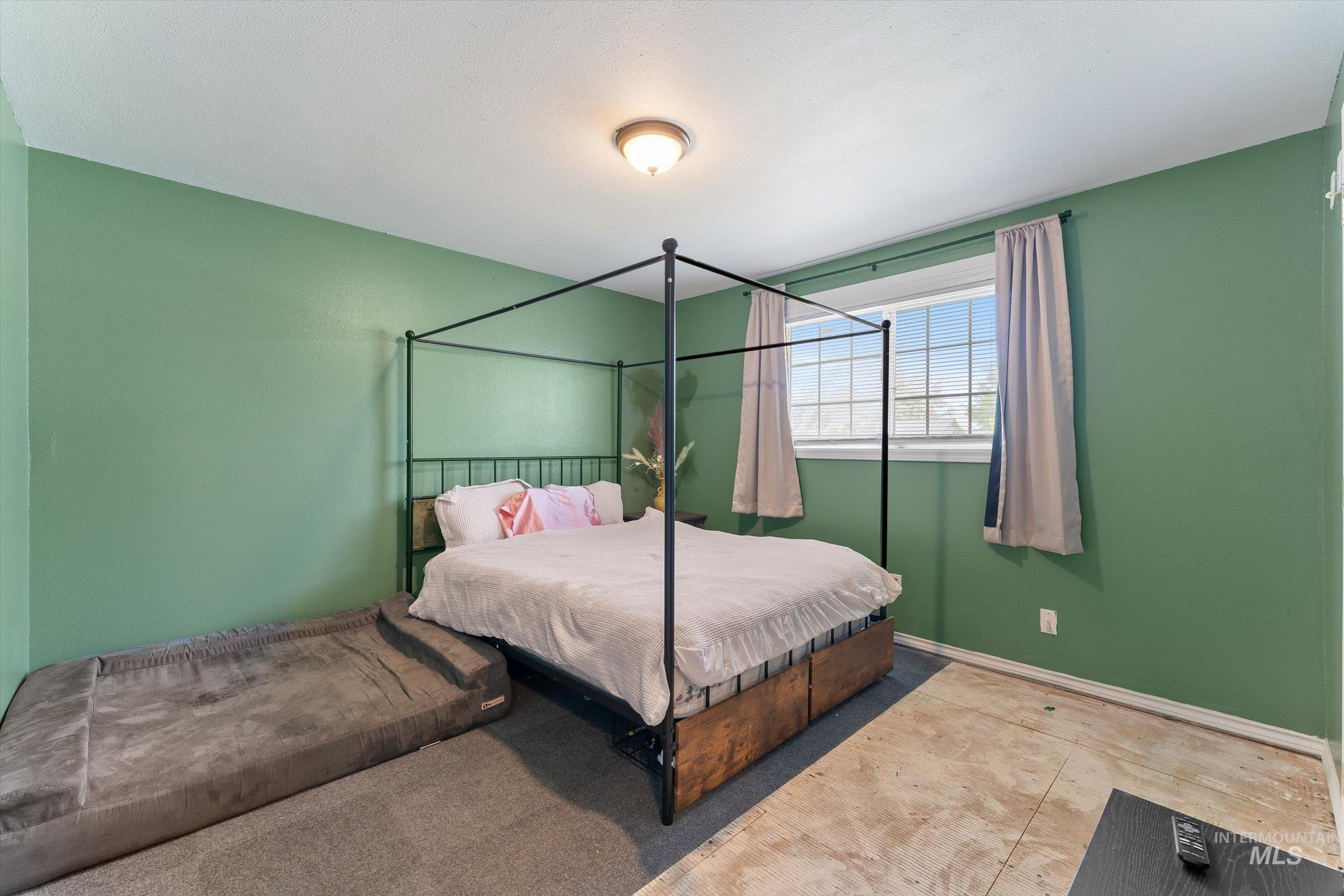 Bedroom with baseboards