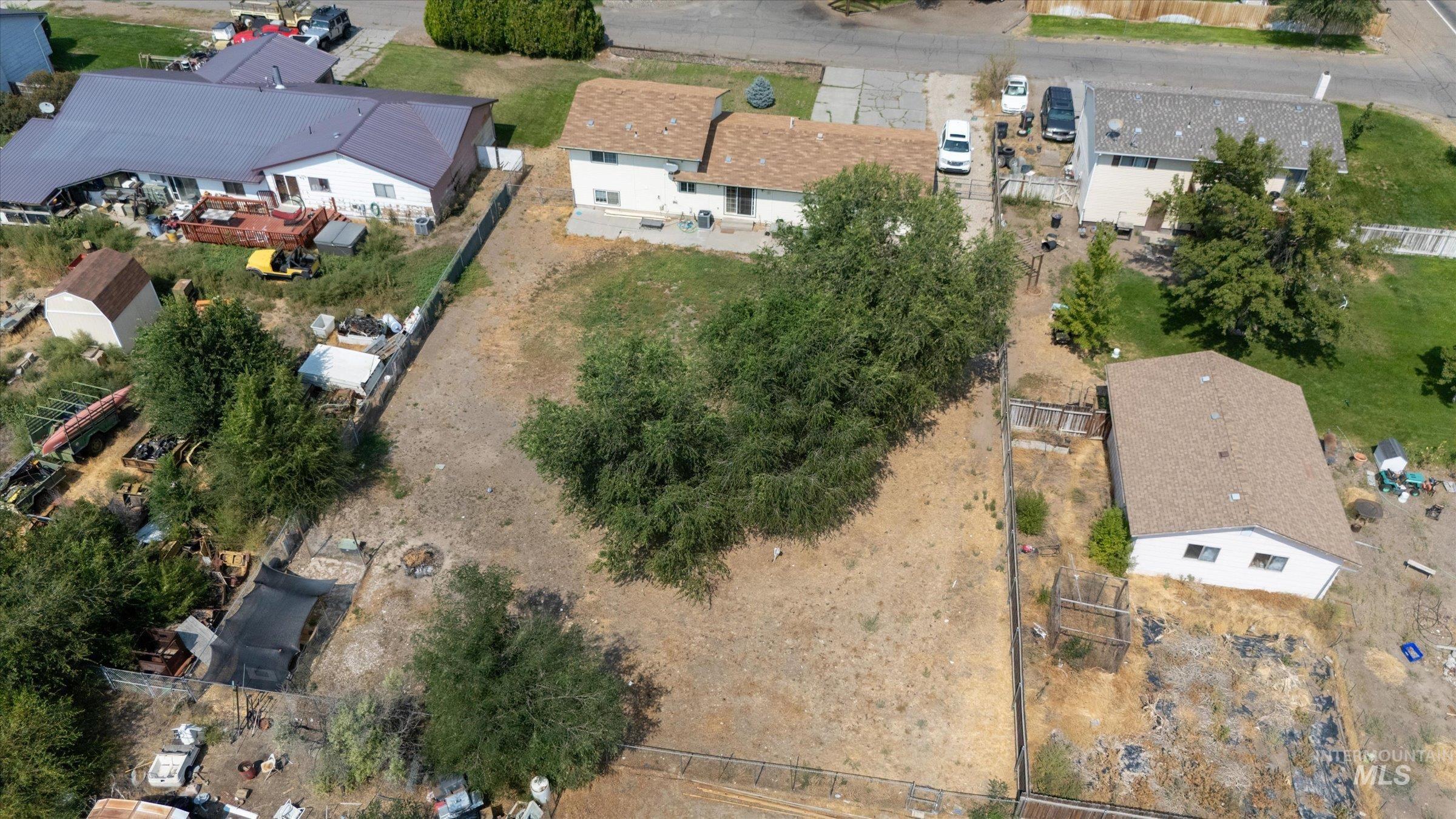 View of property location with nearby suburban area