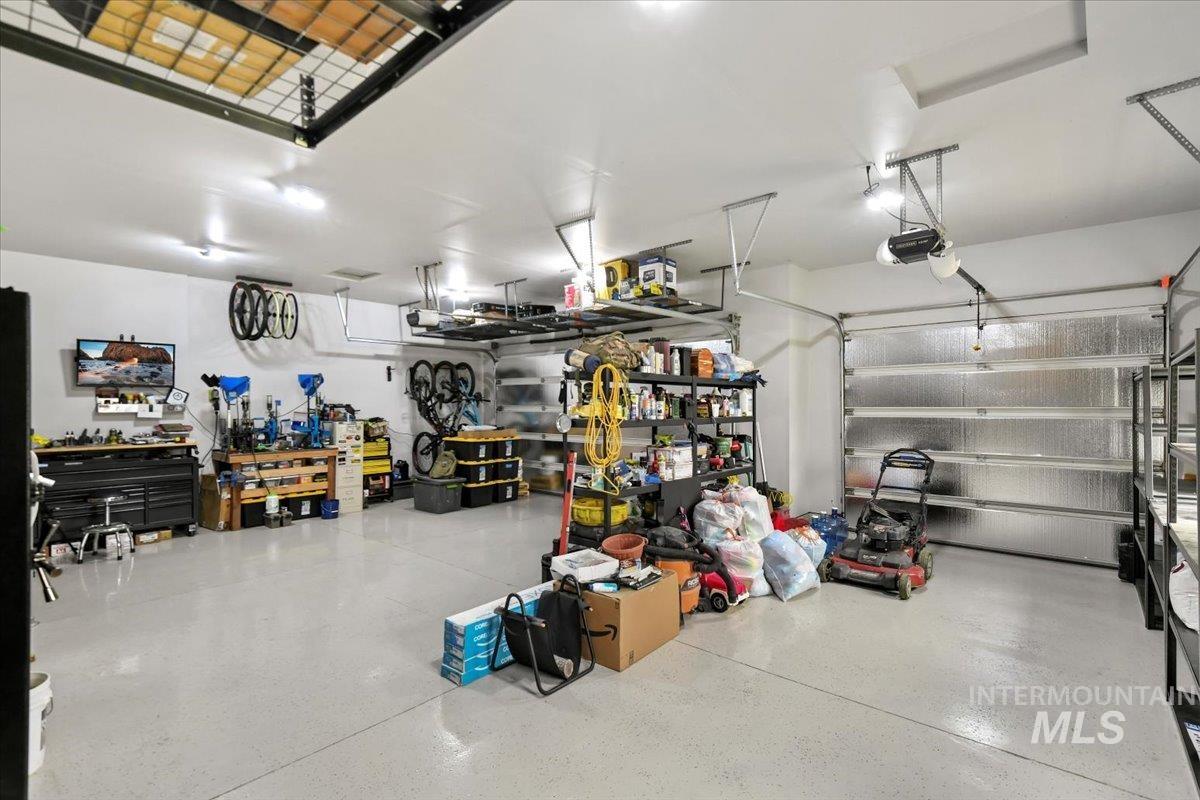 Garage featuring a workshop area