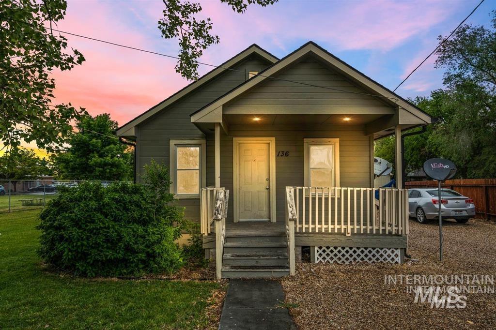 View of front of property with a porch