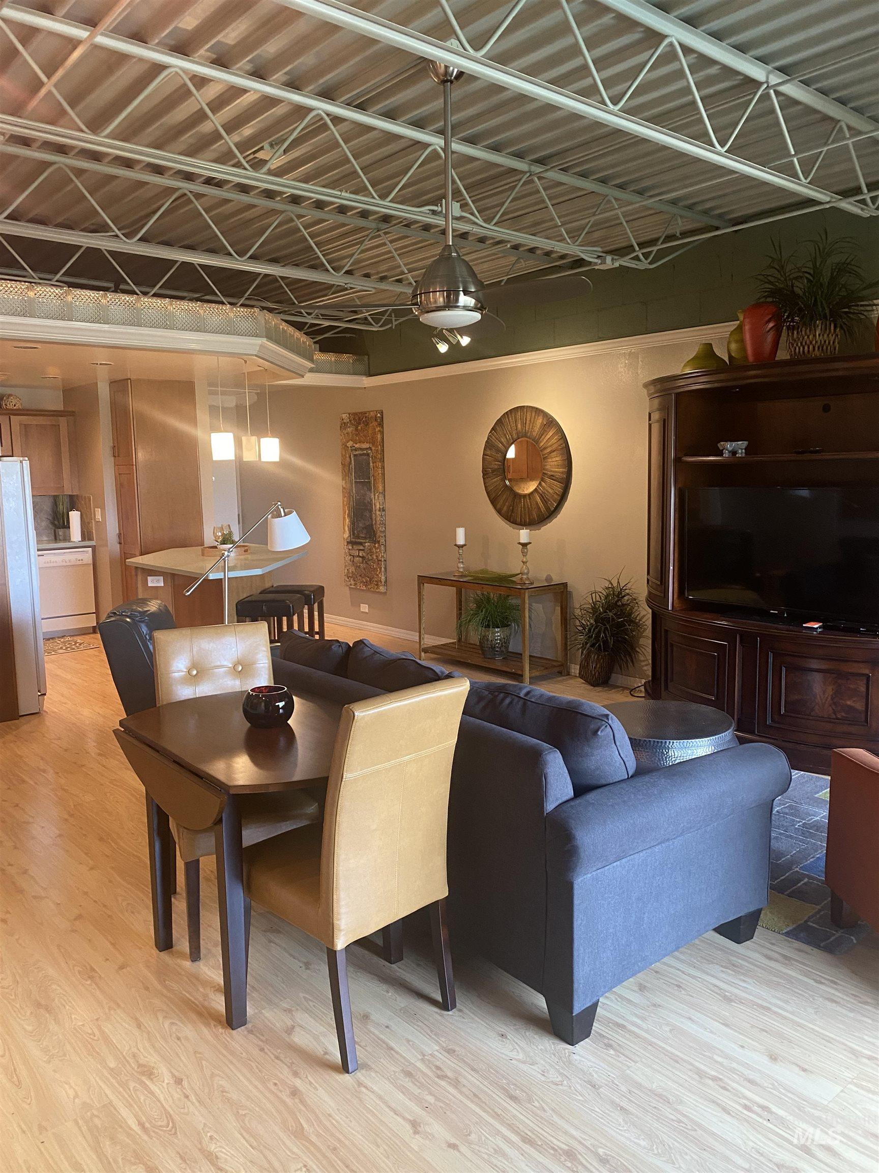 Living area with light wood-style floors