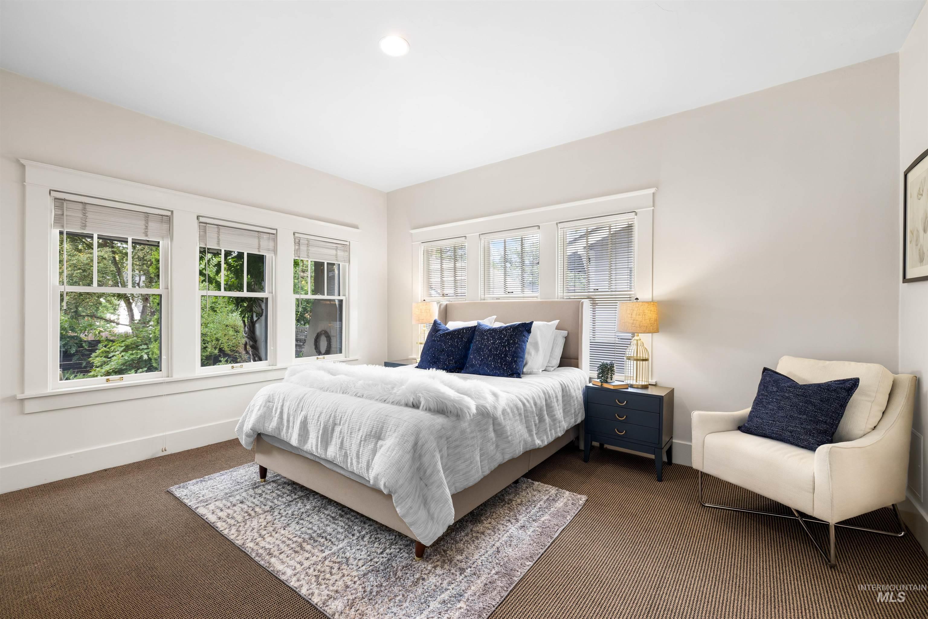 Bedroom with carpet floors and recessed lighting