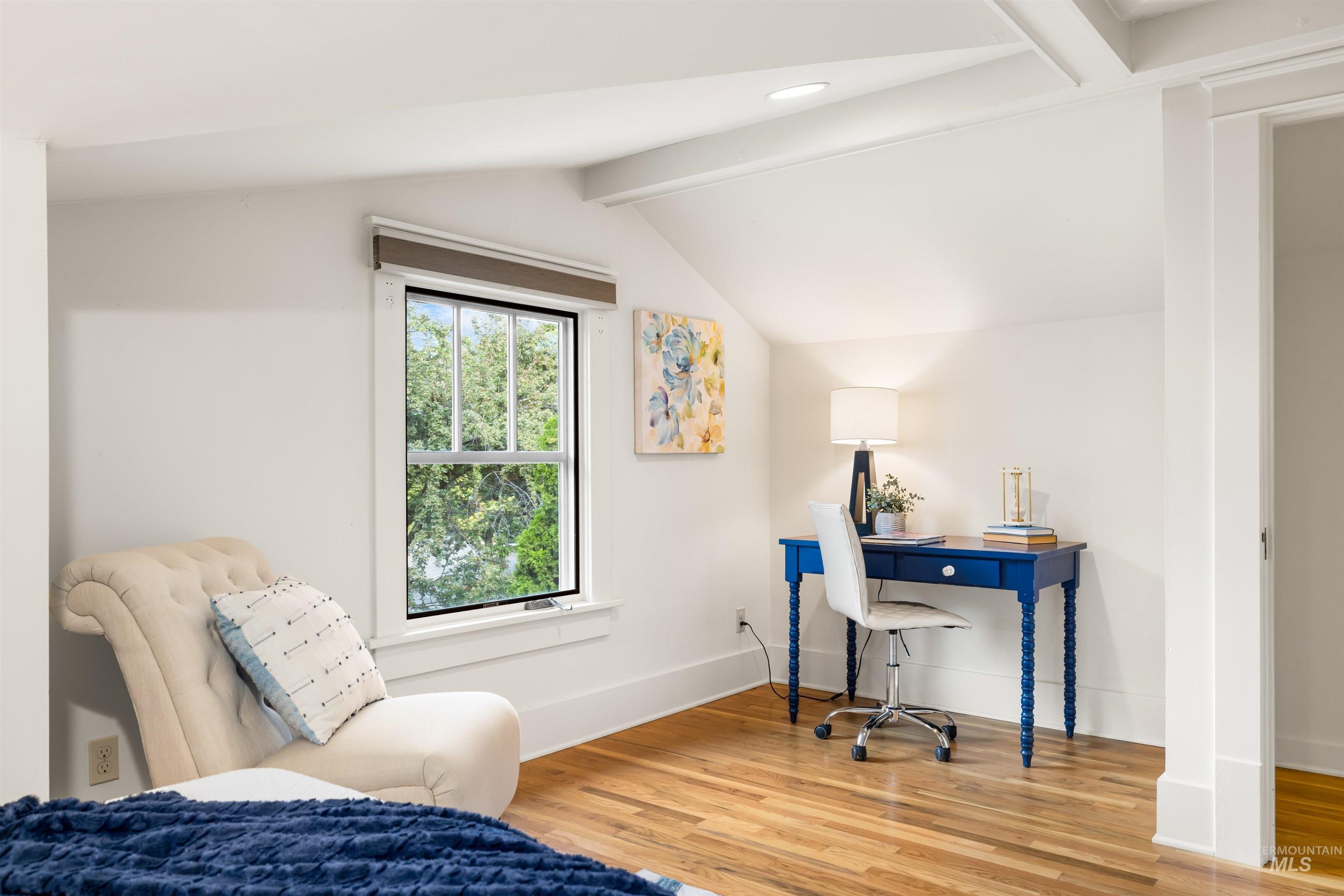 Home office featuring light wood-style floors and recessed lighting