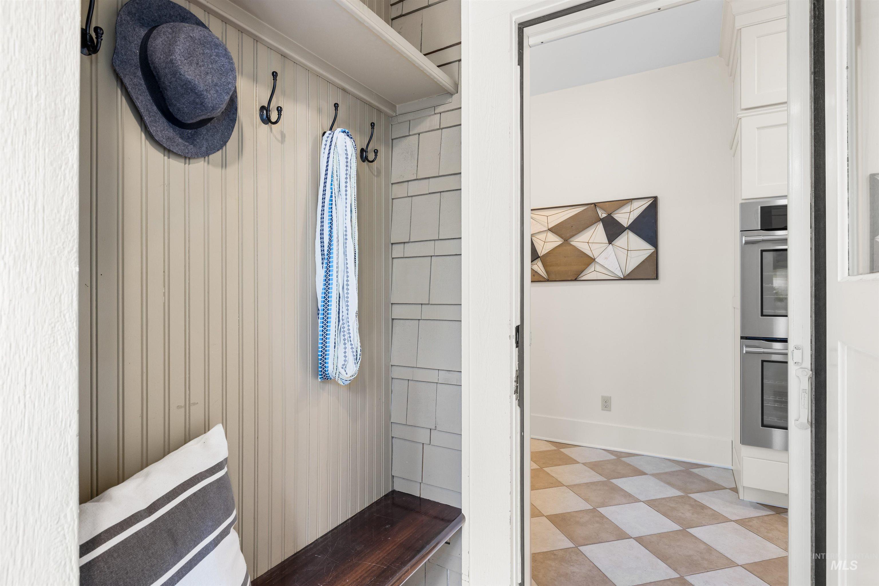 Mudroom featuring baseboards