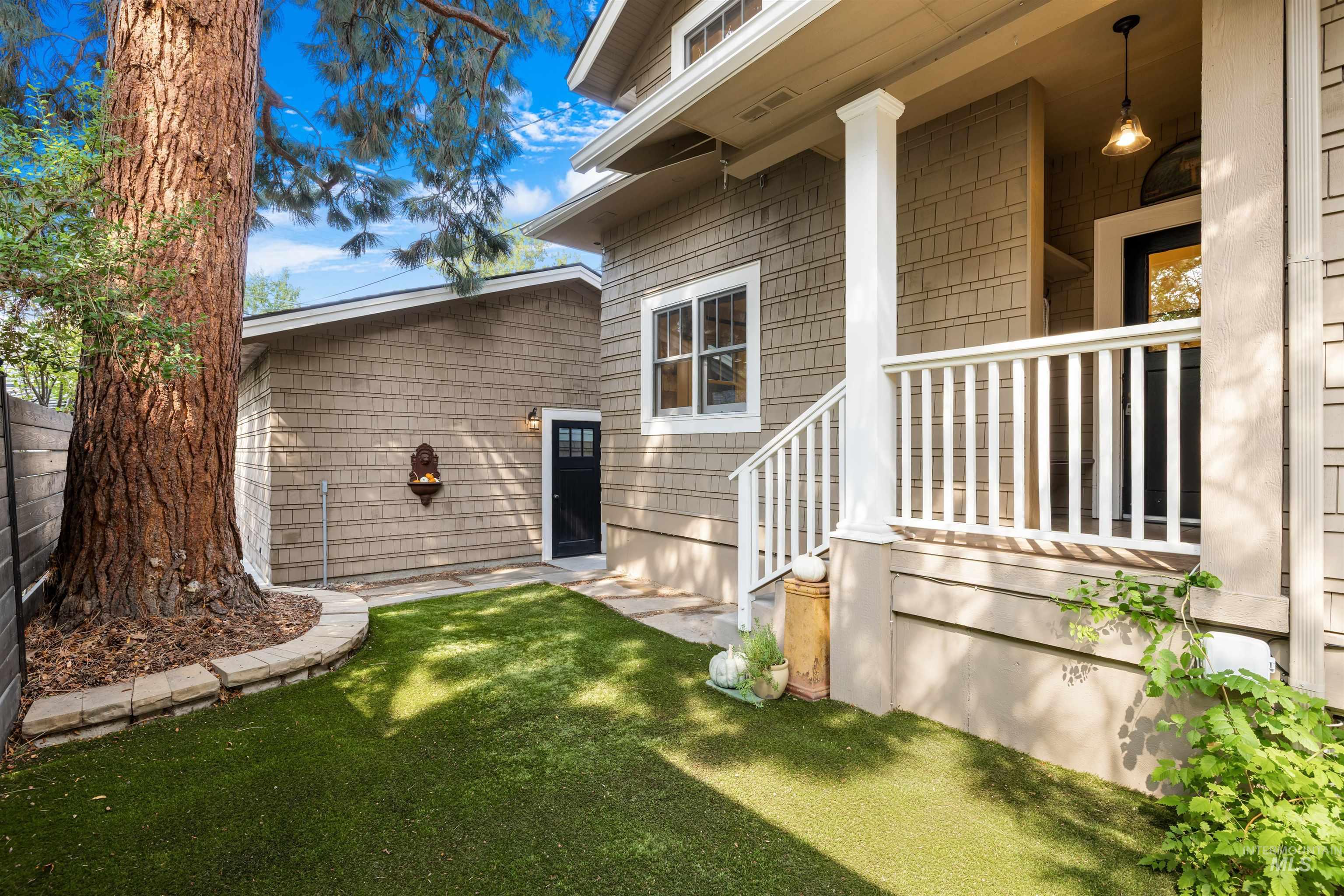 View of property exterior featuring a yard