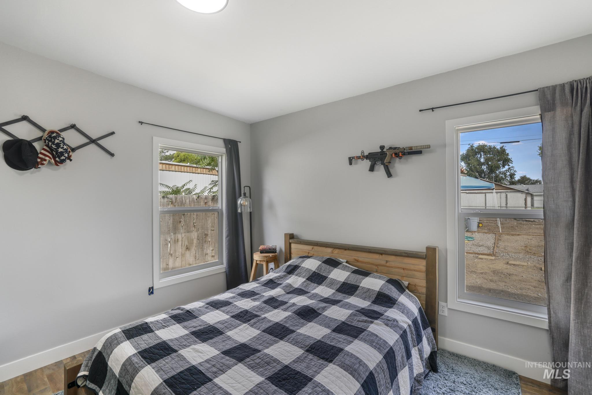 Bedroom featuring wood finished floors