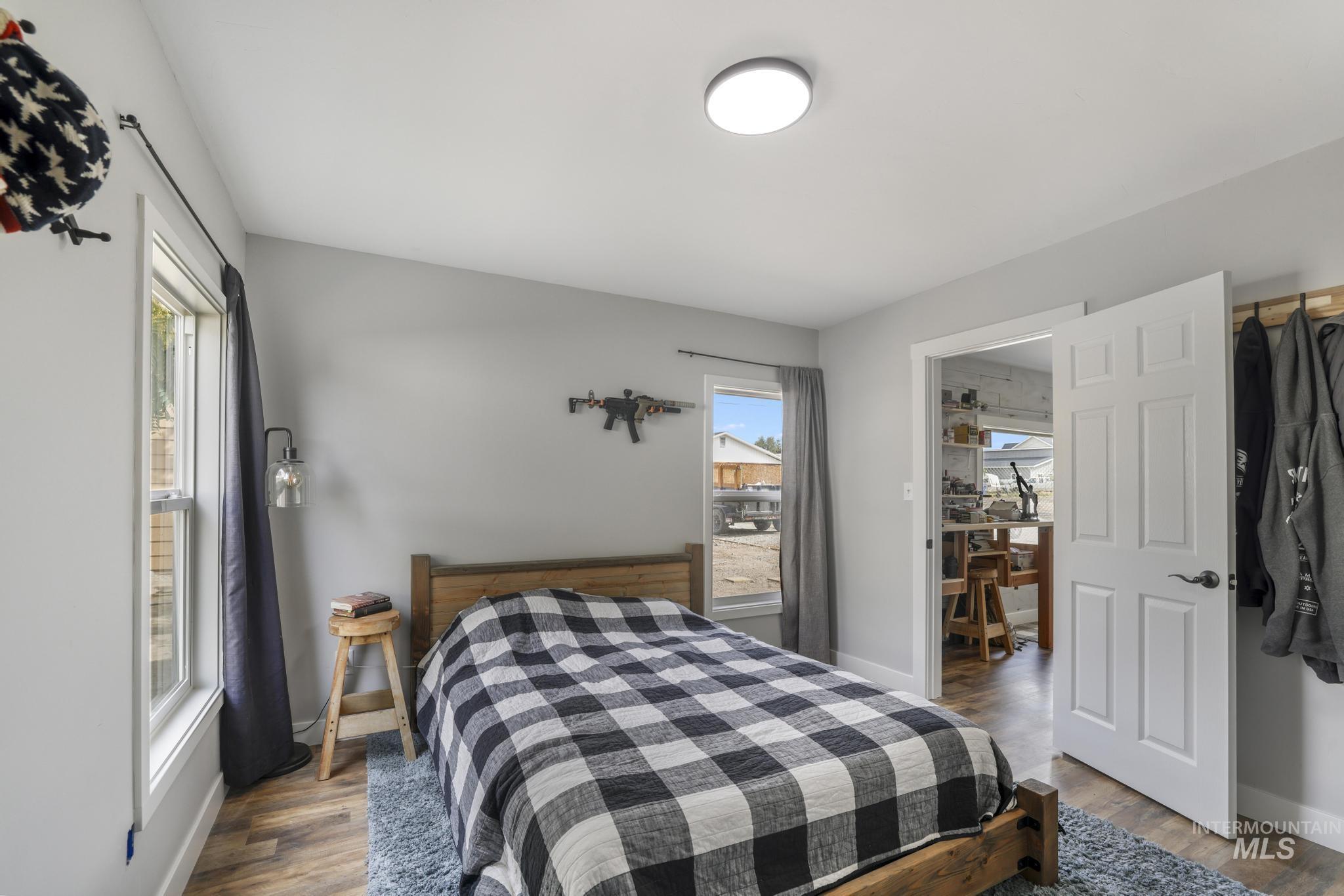 Bedroom with wood finished floors