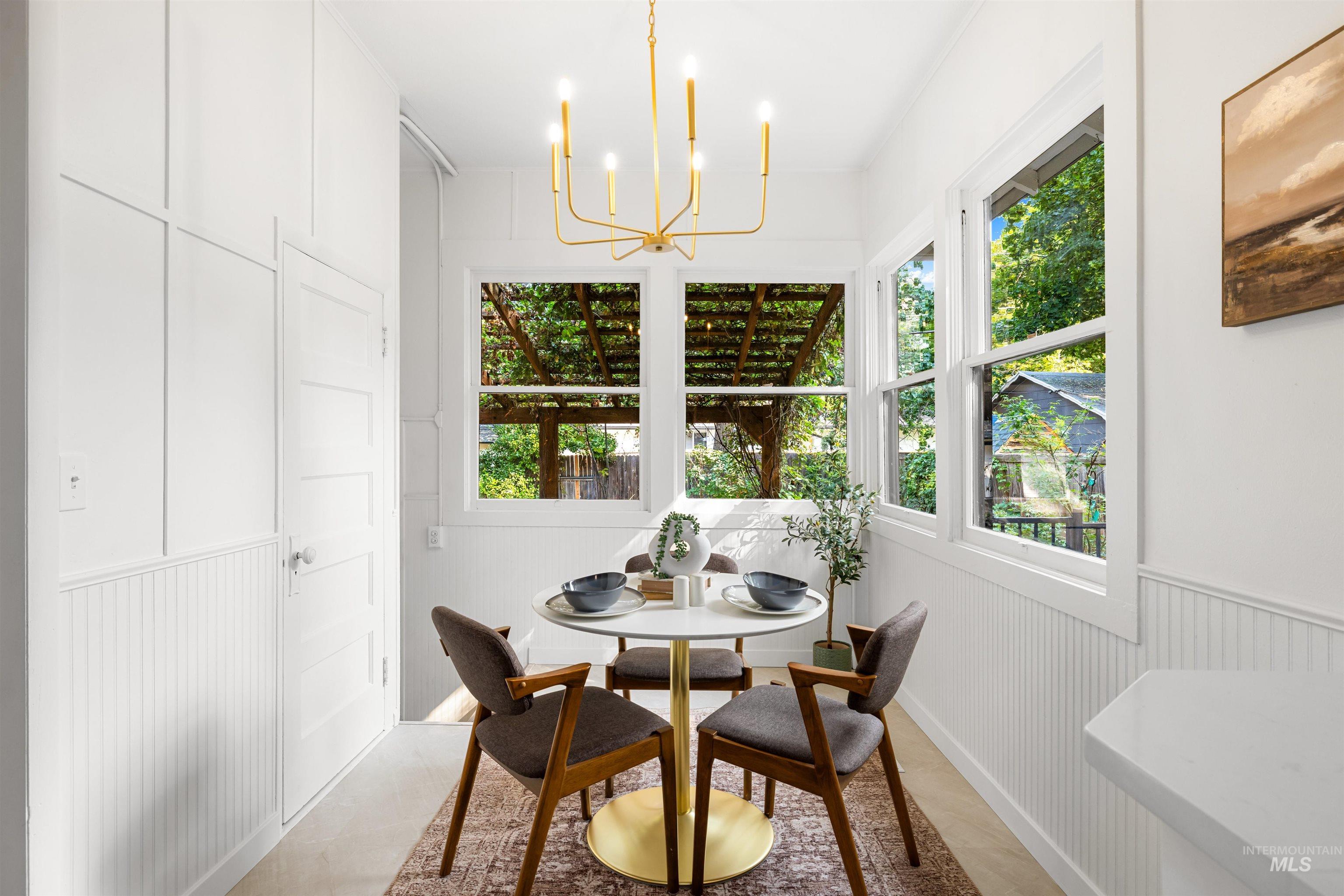 Dining area with a chandelier