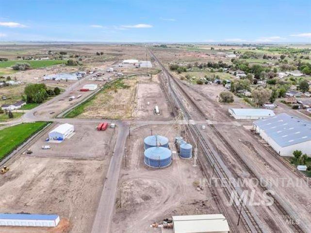 Aerial overview of property's location featuring an industrial area