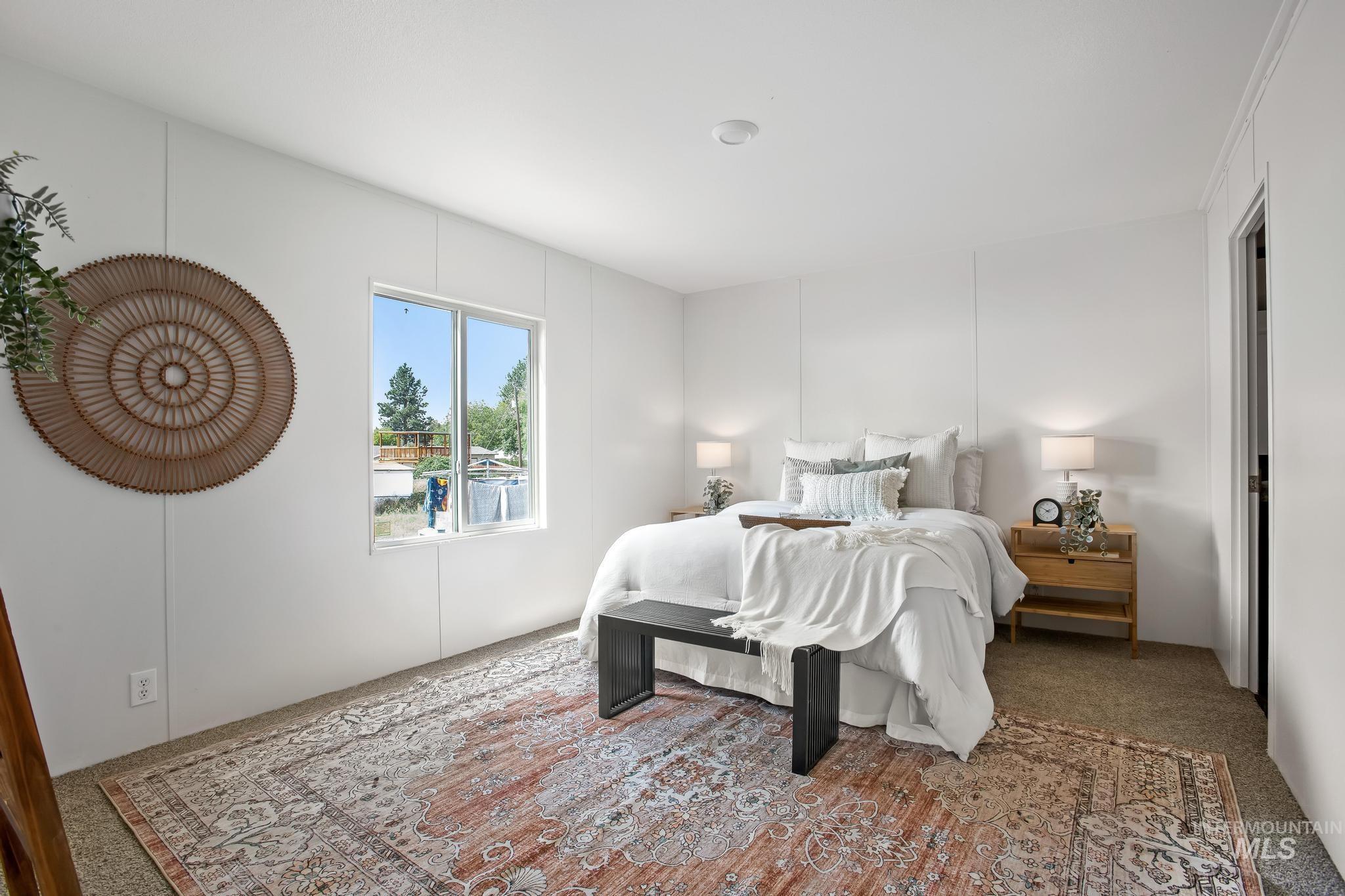 Bedroom featuring carpet flooring