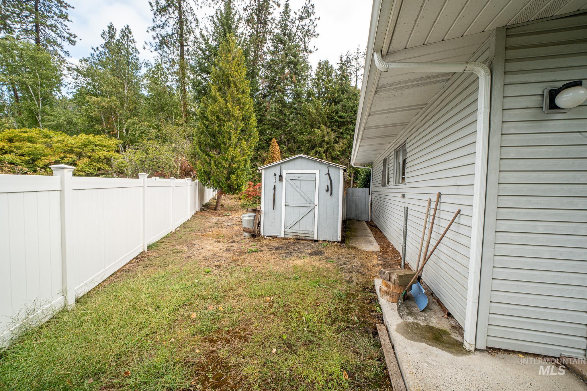 View of yard with a shed