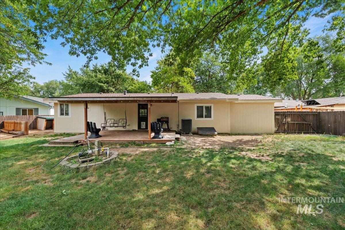 Back of property featuring a patio and stucco siding