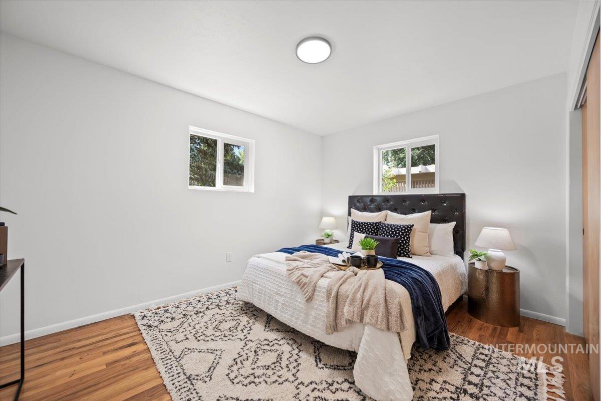 Bedroom featuring wood finished floors