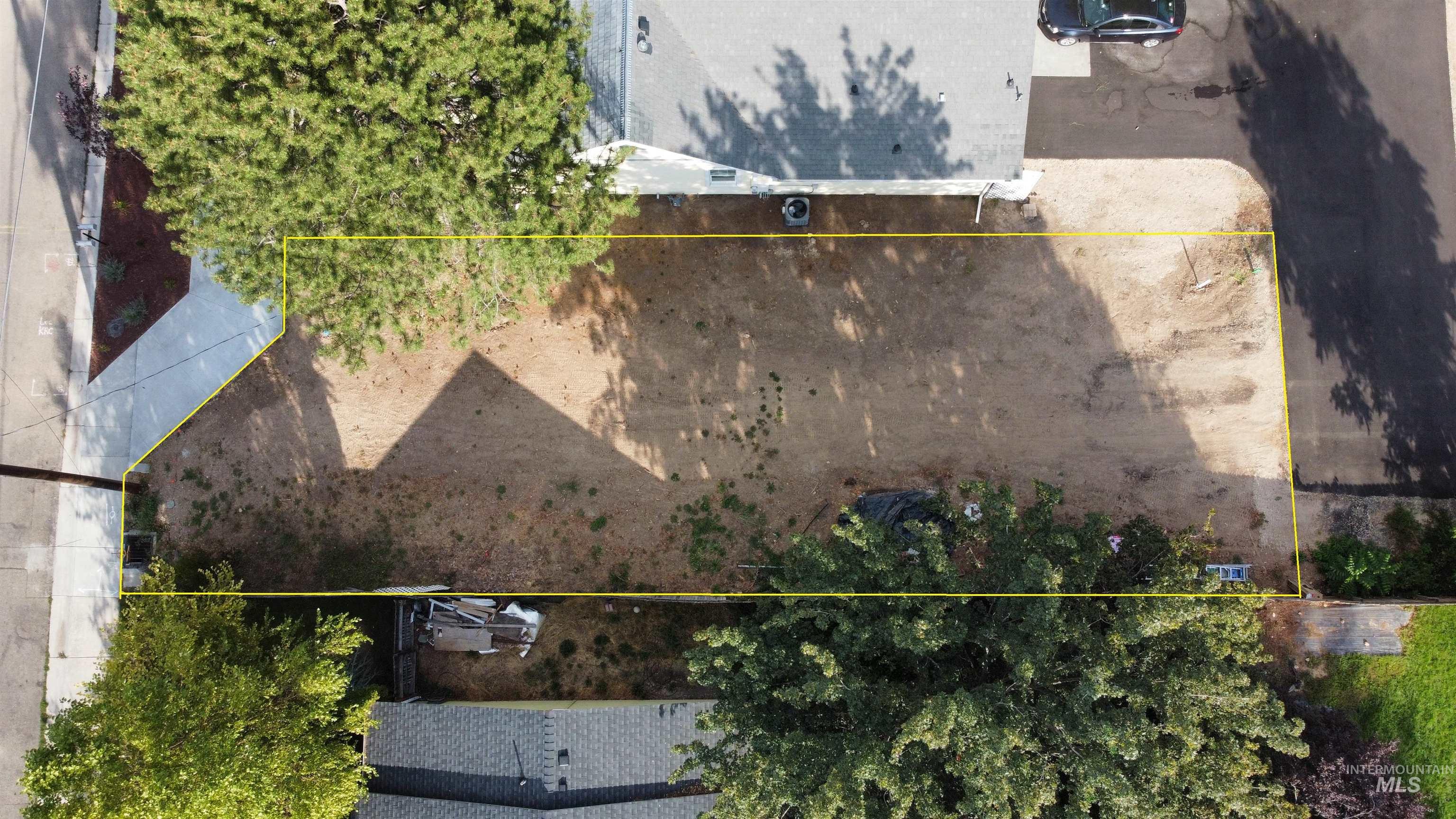 Aerial view of property's location featuring property parcel outlined