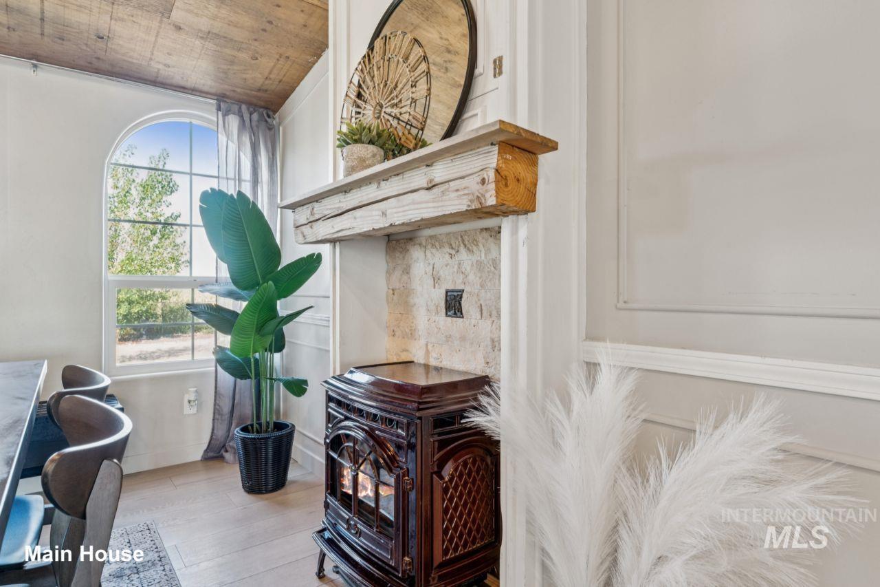 Detailed view of a wood stove and wood finished floors