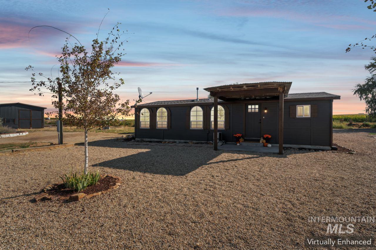View of front of house with a patio area