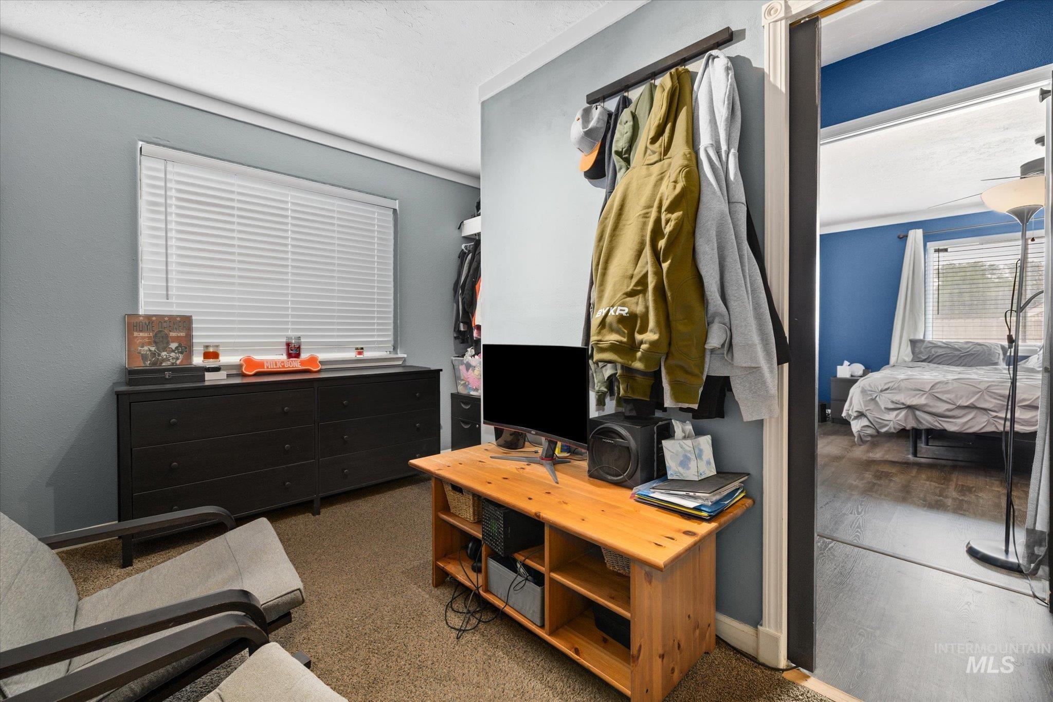 Bedroom featuring carpet flooring