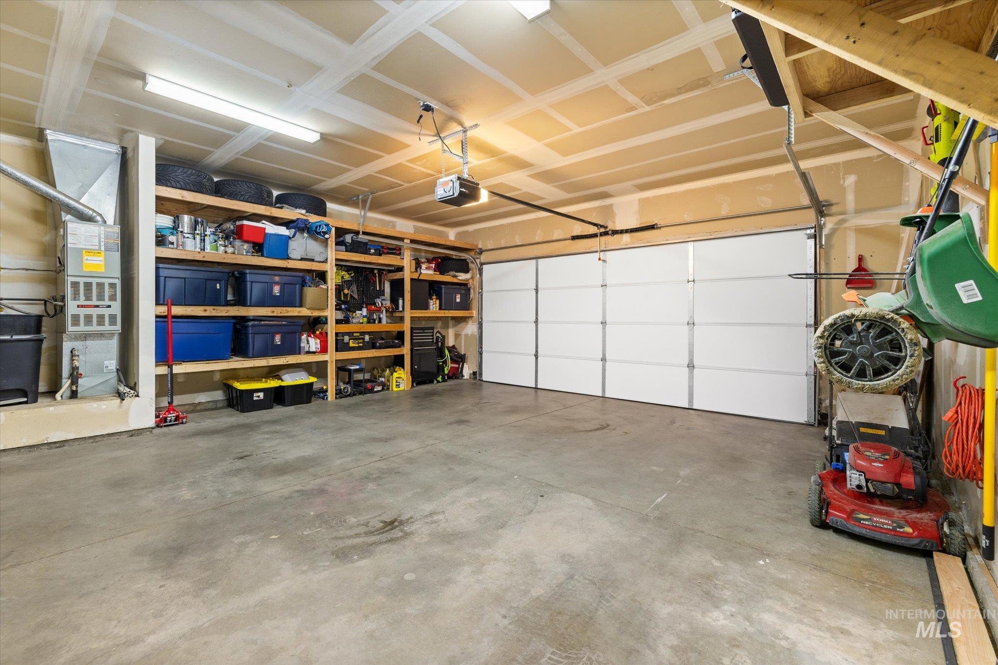 Garage with heating unit and a garage door opener